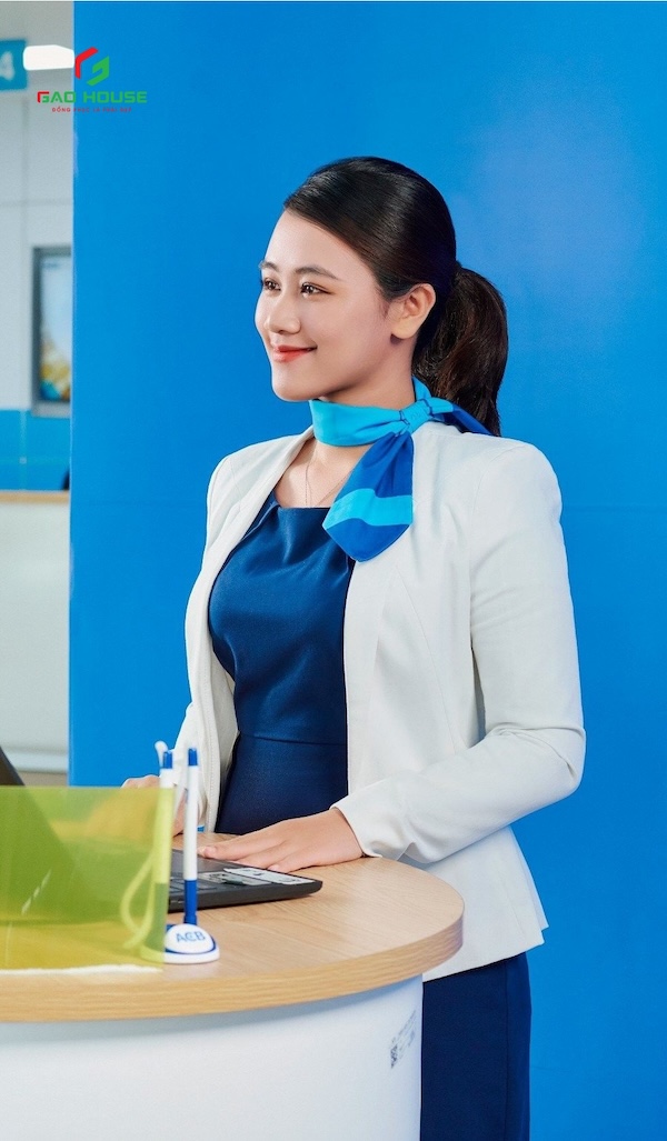 May đồng phục ACB