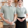 đồng phục nhà hàng màu xanh phối cổ trắng