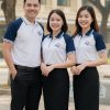 Thiết kế áo đồng phục màu trắng phối Raglan xanh ấn tượng