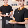 đồng phục nhà hàng màu đen phối cổ cam