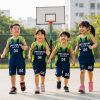 đồng phục mầm non màu xanh than phối xanh lá