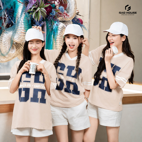 đồng phục team building công ty màu be